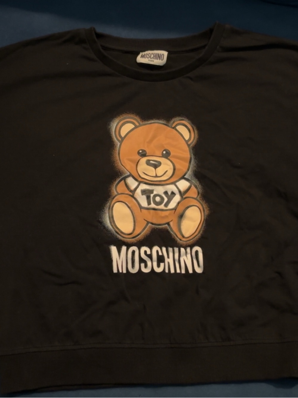 Moschino Kids Black Sweatshirt with Tan Teddy Bear Graphic